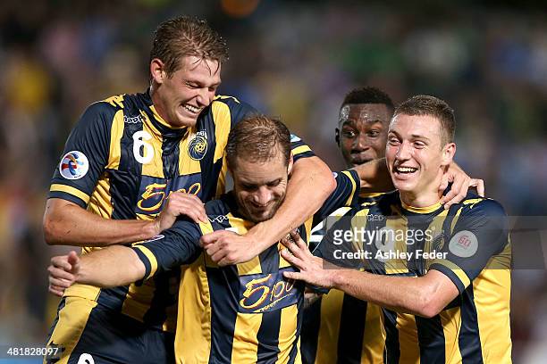 Mariners teammates Nick Fitzgerald Mitchell Duke Marcel Siep and Bernie Ibini celebrate a goal by Marcel Siep of the Mariners during the Asian...