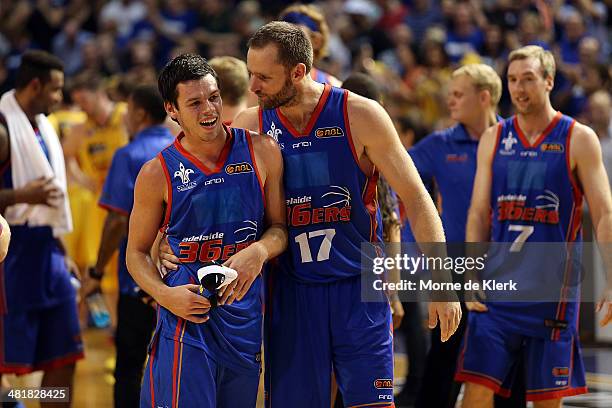 Jason Cadee and Anthony Petrie of the 36ers celebrate after game three of the NBL Semi Final series between the Adelaide 36ers and the Melbourne...
