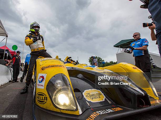 Stephen Simpson celebrates after winning the pole position for the Northeast Grand Prix at Lime Rock Park on July 24, 2015 in Lakeville, Connecticut.