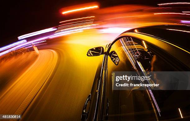 crazy ride on the night by car - city from a new angle stockfoto's en -beelden