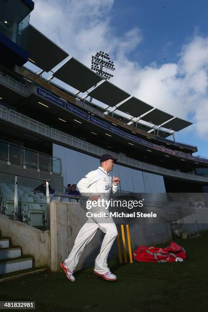 Jonathan Trott of Warwickshire takes to the field making his first senior appearance since the tour of Australia during the friendly match between...