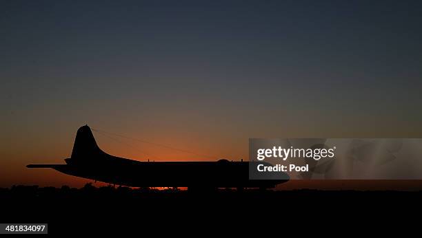 Japan Maritime Self-Defense Force P3 Orion sits on the tarmac at RAAF Base Pearce before searching for wreckage and debris of missing Malaysia...