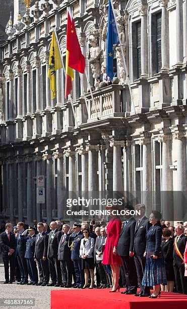 Queen Mathilde of Belgium, Chinese President Jinping Xi, King Philippe of Belgium and the wife of the Chinese President, Peng Liyuan, take part in a...
