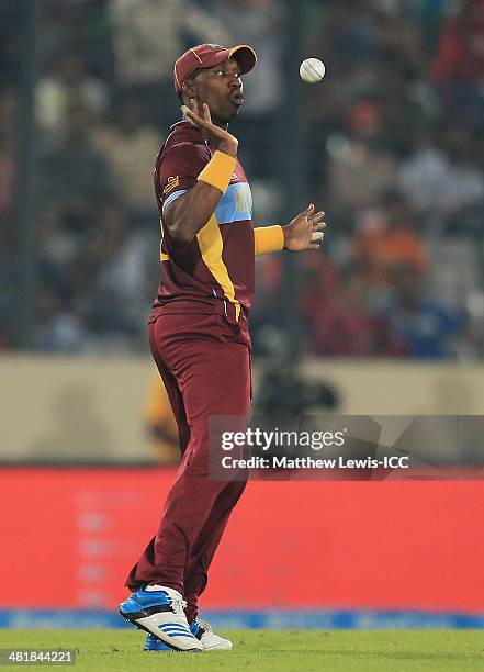 Dwayne Bravo of the West Indies celebrates catching Kamran Akmal of Pakistan off the bowling of samue; Badree during the ICC World Twenty20...