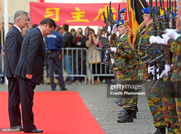 Chinese President Xi Jinping and King Philippe during a departure ceremony following an official visit on April 1, 2014 in Brugge, Belgium.