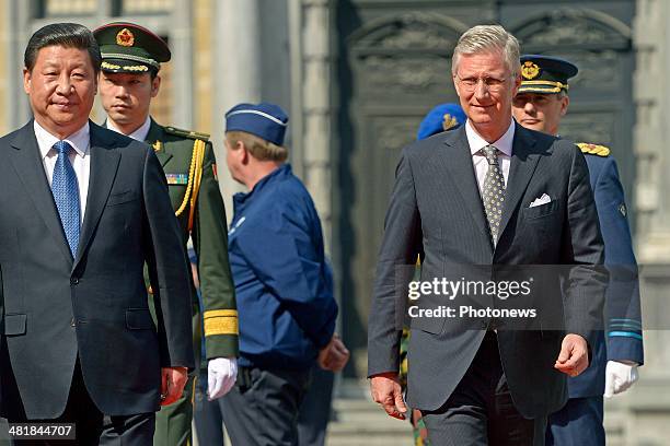 Chinese President Xi Jinping and King Philippe during a departure ceremony following an official visit on April 1, 2014 in Brugge, Belgium.