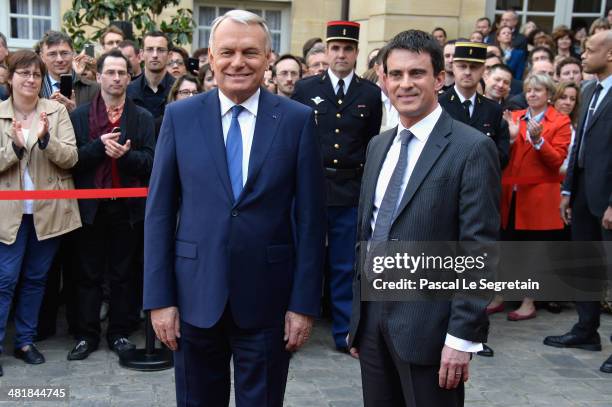 Prime minister Jean-Marc Ayrault and France's newly appointed Prime minister Manuel Valls attend the take over ceremony, while power is transferred...
