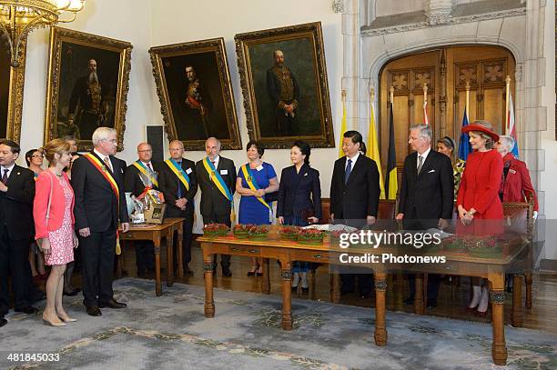 First Lady Xi-Peng Liyuan, Chinese President Xi Jinping, King Philippe and Queen Mathilde during a reception on April 1, 2014 in Bruges, Belgium.