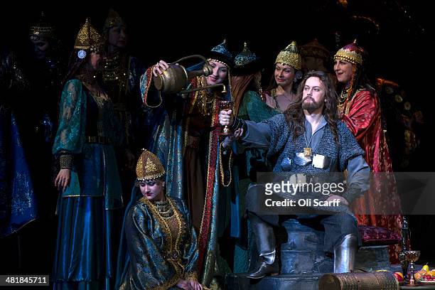 Opera singer Sergey Artamonov , playing the role of Igor Svyatoslavich, performs in the Polovitsian dance during a dress rehearsal of a production of...