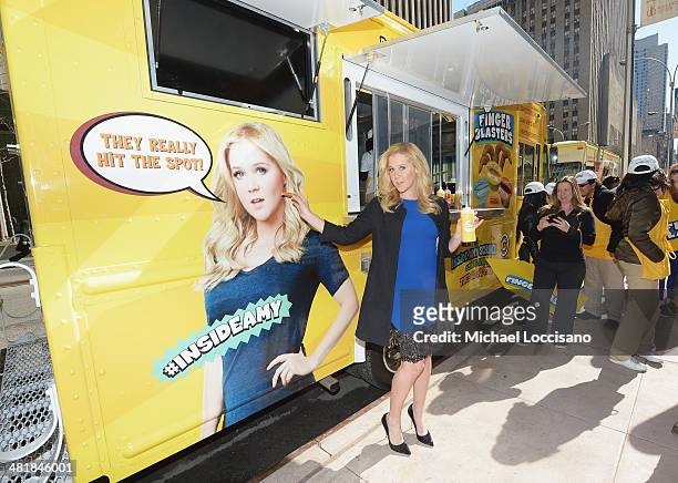 Comedian Amy Schumer promotes her "Finger Blaster" sketch From season 2 of Comedy Central's "Inside Amy Schumer" on April 1, 2014 in New York City.