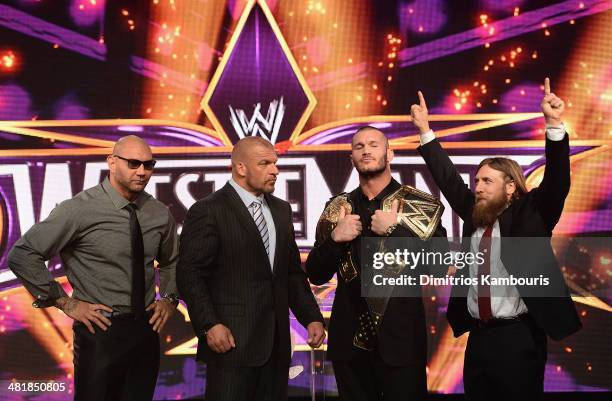 Batista, Triple H, Randy Orton and Daniel Bryan attend the WrestleMania 30 press conference at the Hard Rock Cafe New York on April 1, 2014 in New...