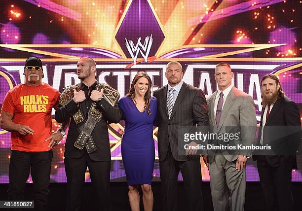 Hulk Hogan, Randy Orton, Stephanie McMahon, Triple H, John Cena and Daniel Bryan attend the WrestleMania 30 press conference at the Hard Rock Cafe...