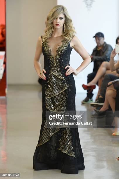 Fernanda Lima attends the Samuel Cirnansck pocket show during Sao Paulo Fashion Week Summer 2014/2015 at the Citroen flagship store on April 1, 2014...