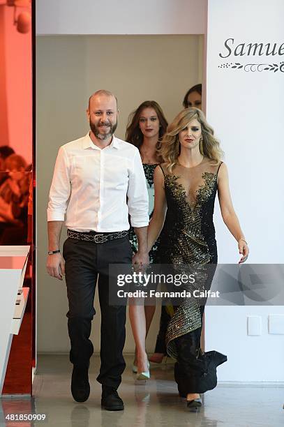 Fernanda Lima and Samuel Cirnansck attend the Samuel Cirnansck pocket show during Sao Paulo Fashion Week Summer 2014/2015 at the Citroen flagship...