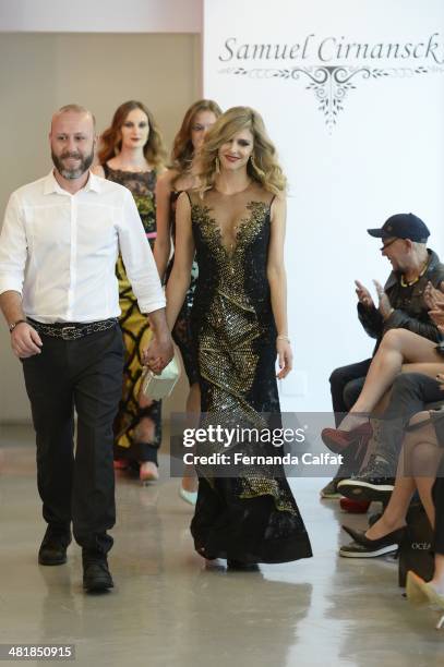 Fernanda Lima and Samuel Cirnansck attend the Samuel Cirnansck pocket show during Sao Paulo Fashion Week Summer 2014/2015 at the Citroen flagship...