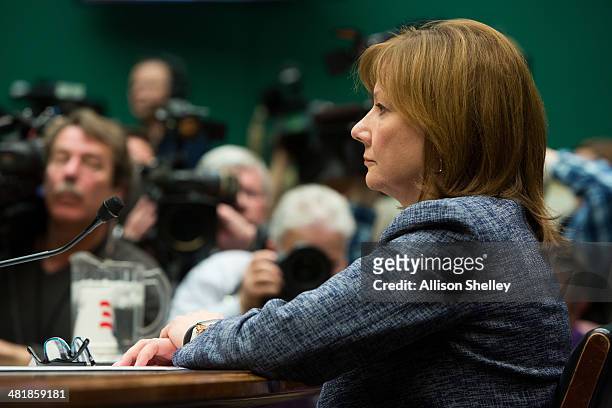 General Motors CEO Mary Barra prepares to testify before the full House Energy and Commerce hearing room in a hearing entitled "The GM Ignition...