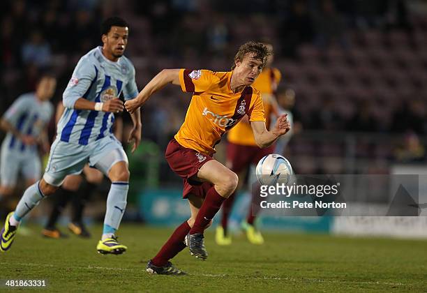 Stephen Darby of Bradford City moves forward with the ball during the Sky Bet League One match between Covenrty City and Bradford City at Sixfields...