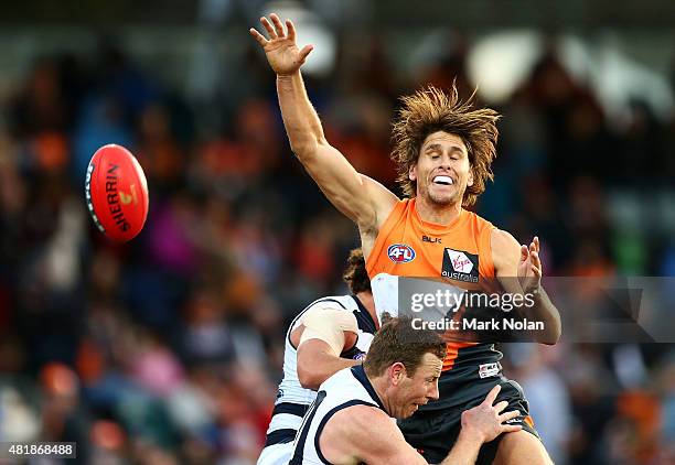 Ryan Griffen of the Giants contest a mark during the round 17 AFL match between the Greater Western Sydney Giants and the Geelong Cats at Star Track...