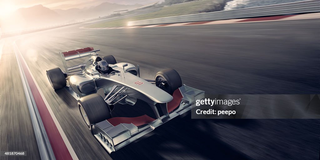 Racing Car At Sunset