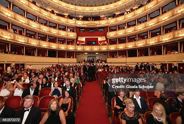 Guests sit inside the Opera during the world premiere of 'Mission: Impossible - Rogue Nation' at the Opera House on July 23, 2015 in Vienna, Austria.