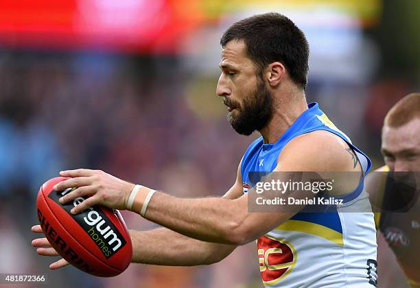 Nick Malceski of the Suns kicks the ball during the round 17 AFL match between the Adelaide Crows and the GOld COast Titans at Adelaide Oval on July...