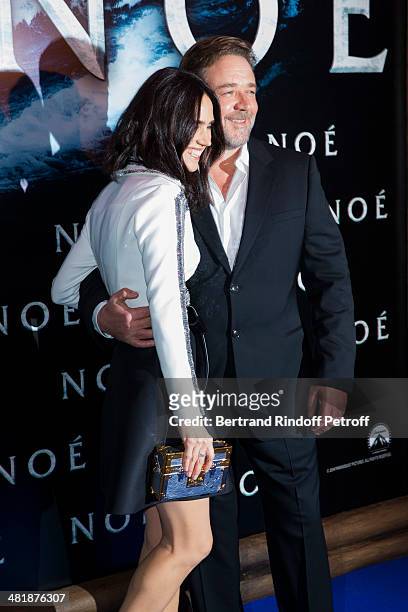 Actors Jennifer Connelly and Russell Crowe pose during the Paris premiere of "Noah" directed by Darren Aronofsky at Cinema Gaumont Marignan on April...
