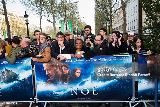 Fans wait outside the theater prior to the Paris premiere of "Noah" directed by Darren Aronofsky at Cinema Gaumont Marignan on April 1, 2014 in...