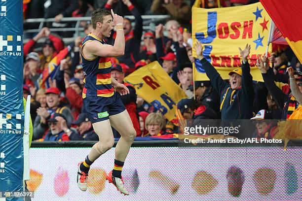 Josh Jenkins of the Crows celebrates a goal during the 2015 AFL round 17 match between the Adelaide Crows and the Gold Coast Suns at the Adelaide...