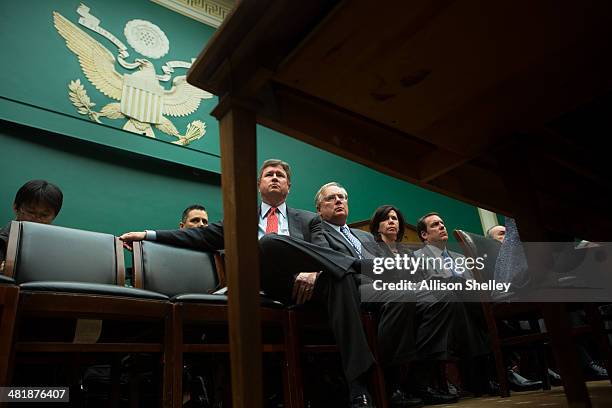 Staff watch from the front row as General Motors CEO Mary Barra testifies before the full House Energy and Commerce hearing room in a hearing...