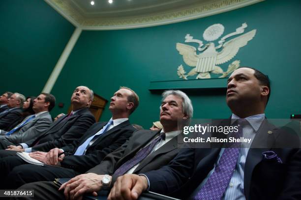 Congressional and GM staff watch from the front row as General Motors CEO Mary Barra testifies before the full House Energy and Commerce hearing room...