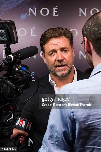 Actor Russell Crowe addresses the media during the Paris premiere of "Noah" directed by Darren Aronofsky at Cinema Gaumont Marignan on April 1, 2014...