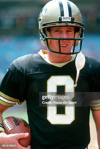 Quarterback Archie Manning of the New Orleans Saints looks on prior to the start of an NFL football game against the Atlanta Falcons at...
