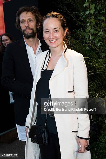Harumi Klossowska De Rola and her husband Benoit Peverelli attend the Paris premiere of "Noah" directed by Darren Aronofsky at Cinema Gaumont...