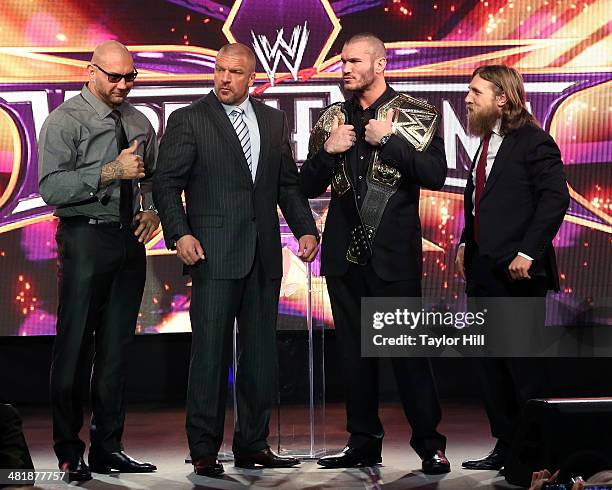 Dave Batista, Triple H, Randy Orton, and Daniel Bryan attend the WrestleMania 30 press conference at the Hard Rock Cafe New York on April 1, 2014 in...