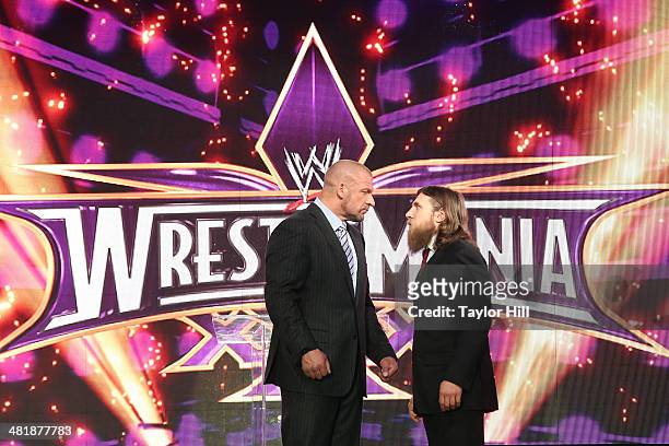 Triple H and Daniel Bryan attend the WrestleMania 30 press conference at the Hard Rock Cafe New York on April 1, 2014 in New York City.