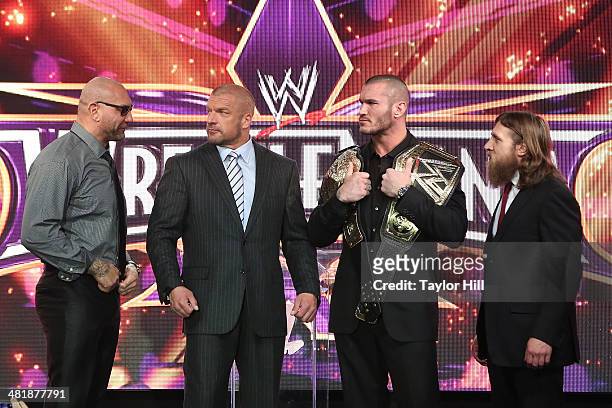 Dave Batista, Triple H, Randy Orton, and Daniel Bryan attend the WrestleMania 30 press conference at the Hard Rock Cafe New York on April 1, 2014 in...
