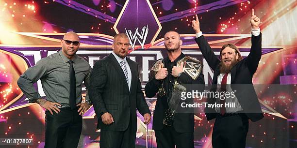 Dave Batista, Triple H, Randy Orton, and Daniel Bryan attend the WrestleMania 30 press conference at the Hard Rock Cafe New York on April 1, 2014 in...