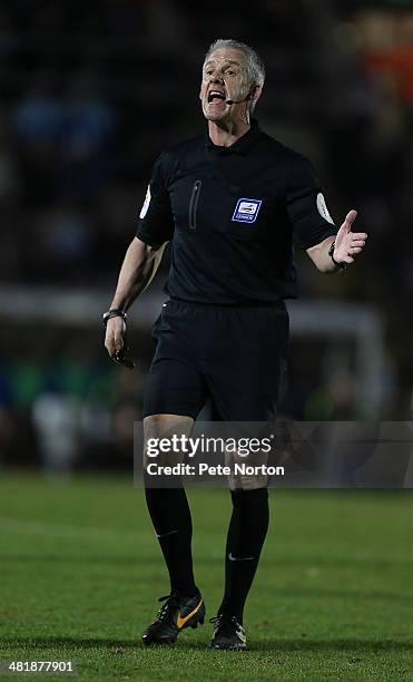 Referee Chris Foy in action during the Sky Bet League One match between Coventry City and Bradford City at Sixfields Stadium on April 1, 2014 in...