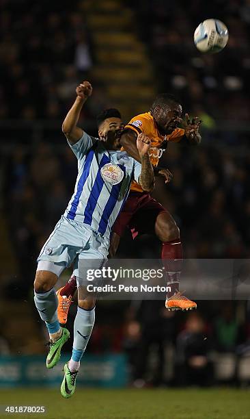 Aaron McLean of Bradford City contests the ball with Jordan Willis of Coventry City during the Sky Bet League One match between Coventry City and...
