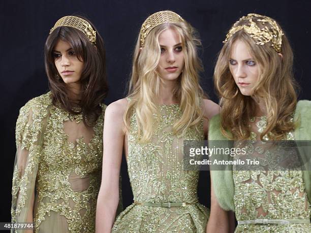 Models prepares backstage prior to Elie Saab show as part of Paris Fashion Week Haute-Couture Fall/Winter 2015/2016 at Pavillon Cambon Capucines on...