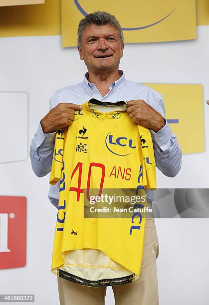 Bernard Thevenet receives a special yellow jersey celebrating the 40th anniversary of his victory in Pra Loup in front of Eddy Merckx before winning...