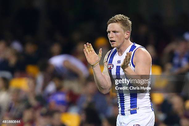 Jack Ziebel of the Kangaroos celebrates a goal during the round 17 AFL match between the Brisbane Lions and the North Melbourne Kangaroos at The...