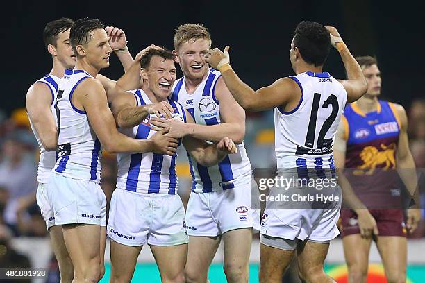 Brent Harvey of the Kangaroos celebrates after kicking a goal during the round 17 AFL match between the Brisbane Lions and the North Melbourne...