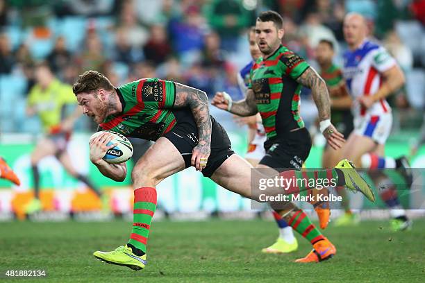 Chris McQueen of the Rabbitohs makes a break during the round 20 NRL match between the South Sydney Rabbitohs and the Newcastle Knights at ANZ...