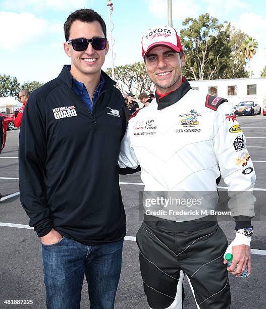 Professional driver Al Unser Jr., and actor Colin Egglesfield attend the 37th Annual Toyota Pro/Celebrity Race Practice Day on April 1, 2014 in Long...