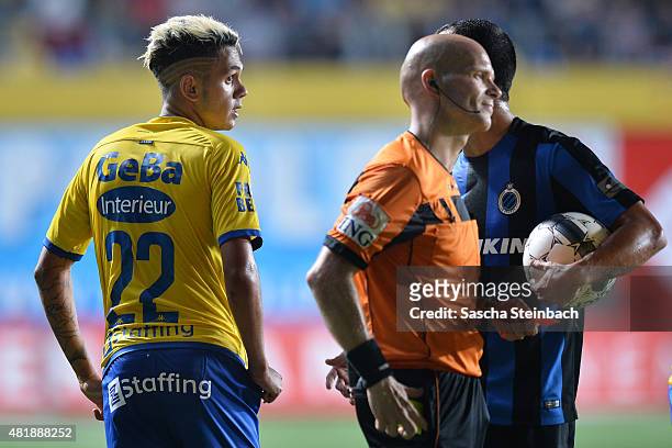 Junior Edmilson of Sint-Truiden reacts after being shown the red card by referee Sebastien Delferiere during the Jupiler league match between...