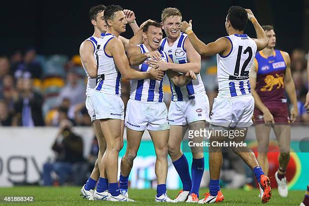 Brent Harvey of the Kangaroos celebrates after kicking a goal during the round 17 AFL match between the Brisbane Lions and the North Melbourne...
