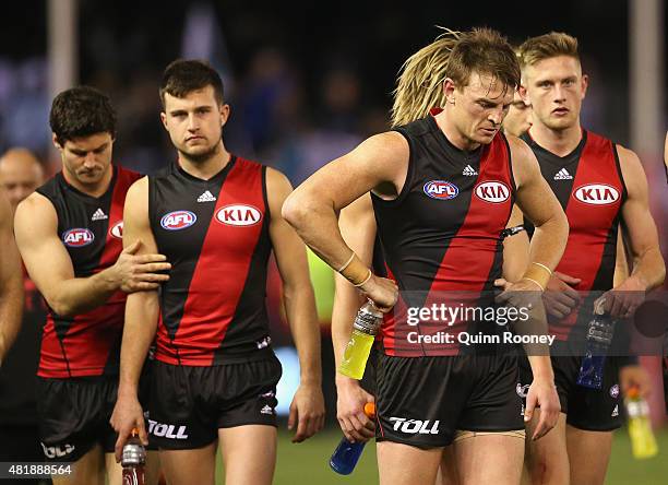 The Bombers look dejected after losing the round 17 AFL match between the Essendon Bombers and the Port Adelaide Power at Etihad Stadium on July 25,...