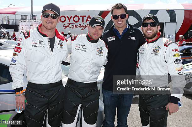 Actors Cole Hauser, and Brett Davern, professional driver Al Unser, Jr., and actor Max Thieriot attend the 37th Annual Toyota Pro/Celebrity Race...