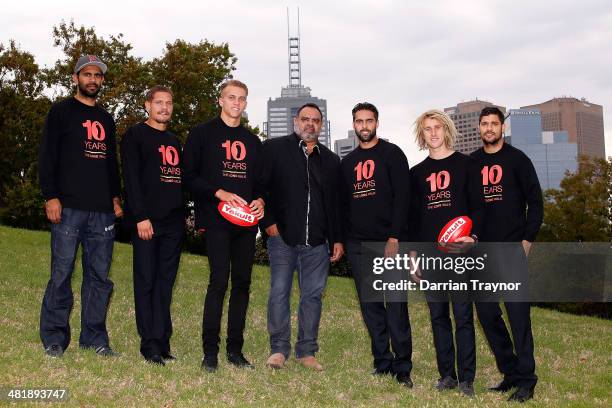 Michael Long poses for a photo with Nathan Lovett-Murray, Leroy Jetta, Shaun Edwards, Courtenay Dempsey, Dyson Heppell and Patrick Ryder during an...